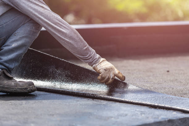 Professional Basement Waterproofing technician working in Bancroft, MI